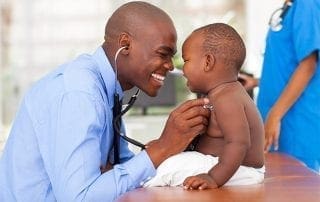 male nurse with baby